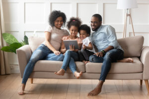 Happy family spend time with laptop